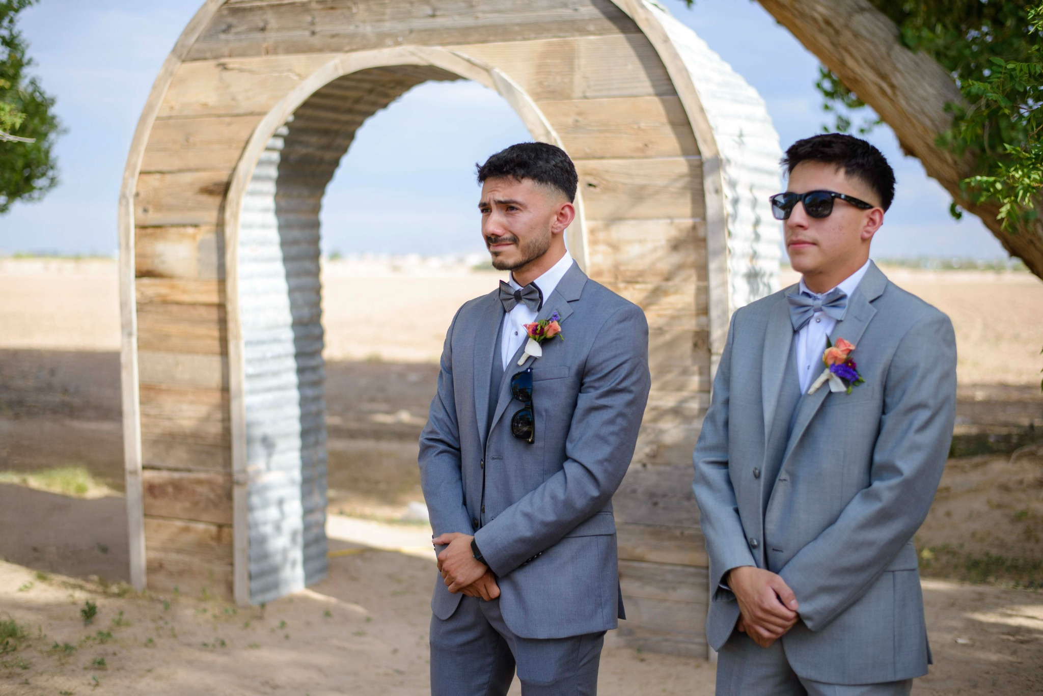 Emotional groom during an outdoor wedding ceremony